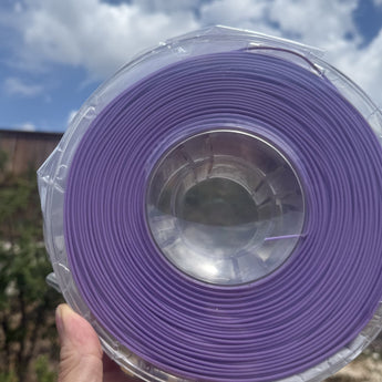 ABS-GF Filament - Purple, spool in daylight