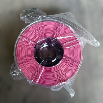 Pink ABS-GF glass-fiber reinforced 3D printer filament spool sealed in plastic
