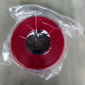 Red Decent ABS-GF glass-fiber reinforced ABS 3D printer filament spool sealed in plastic