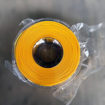 Yellow Decent ABS-GF glass-fiber reinforced ABS 3D printer filament spool sealed in plastic