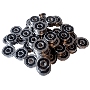 Pile of F623-2RS flanged miniature ball bearings with black rubber seals for 3mm shafts